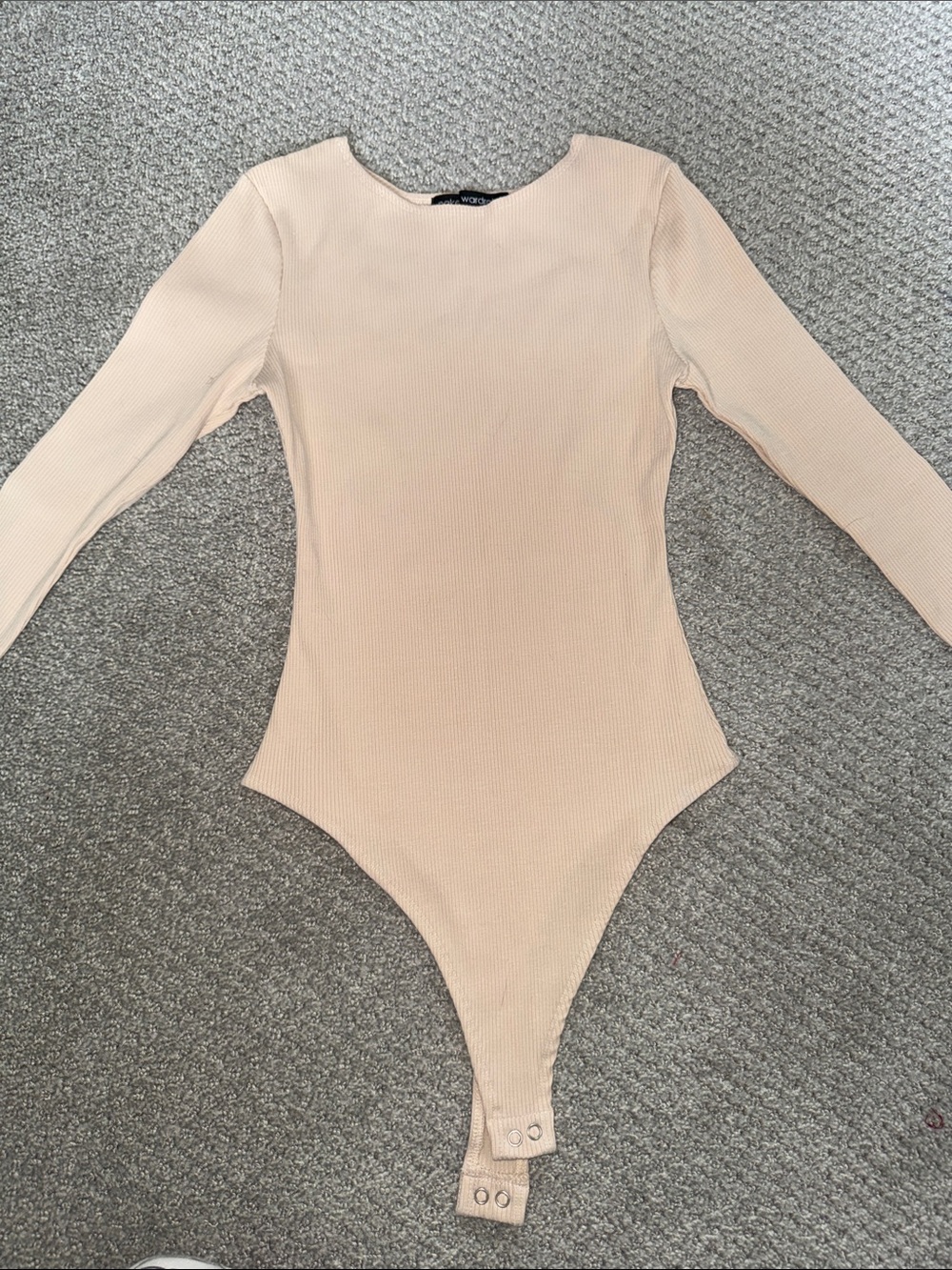 naked wardrobe Long-Sleeve Ribbed One-Piece Bodysuit in Light Beige